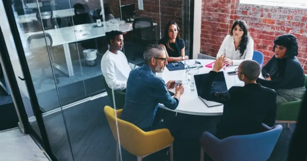 Blog_GTM_FeatureImage_1200x628 Product Marketing Managers discussing Go-to-Market Strategies