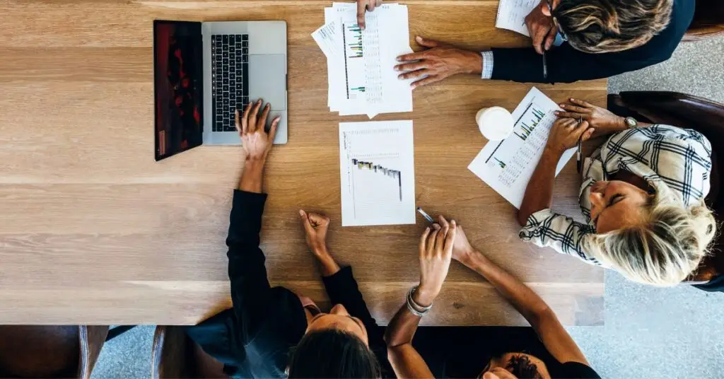 A group of product managers working around a table
